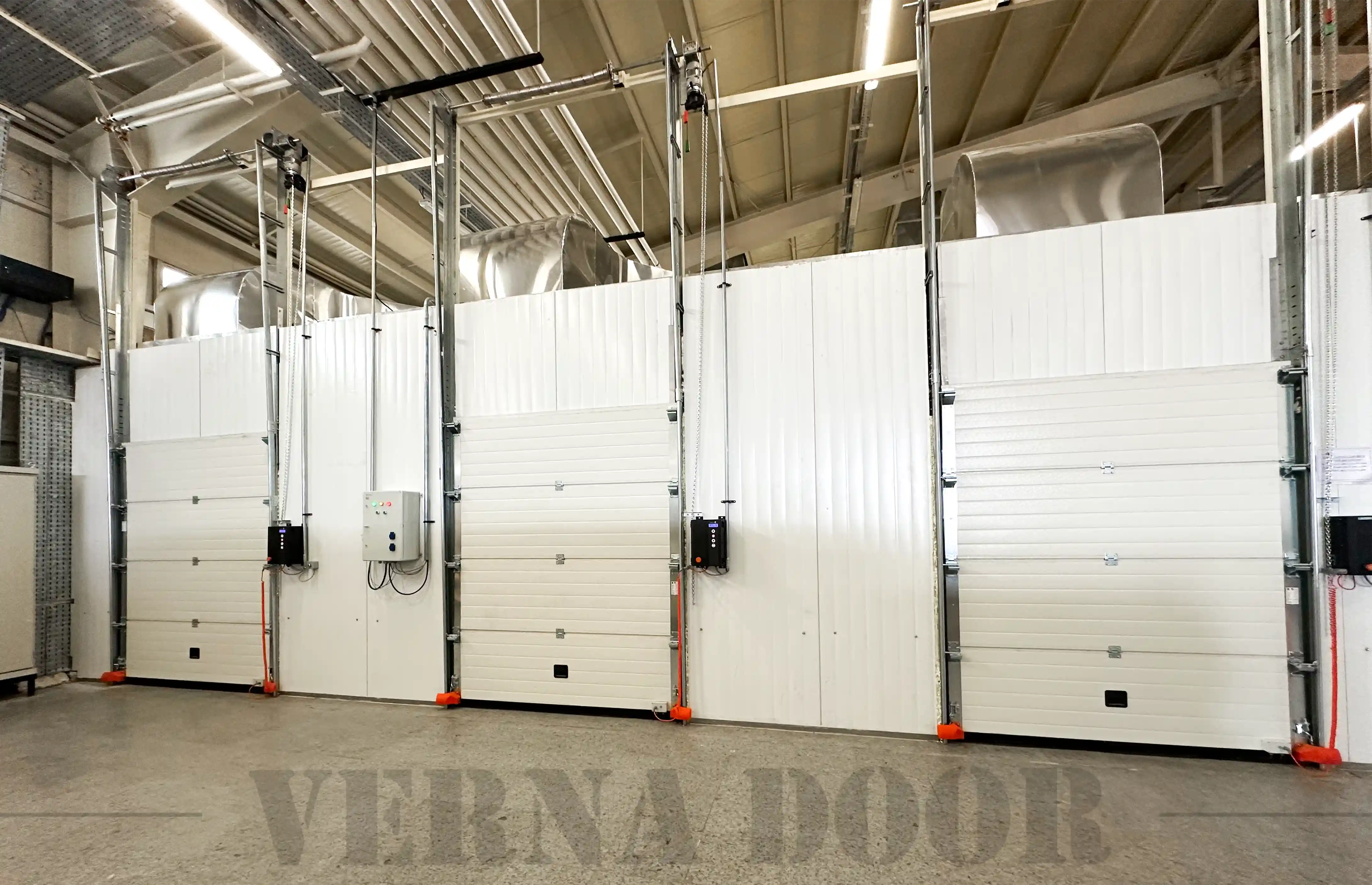sectional industrial garage door vernadoor installed in storage facility for commercial purposes