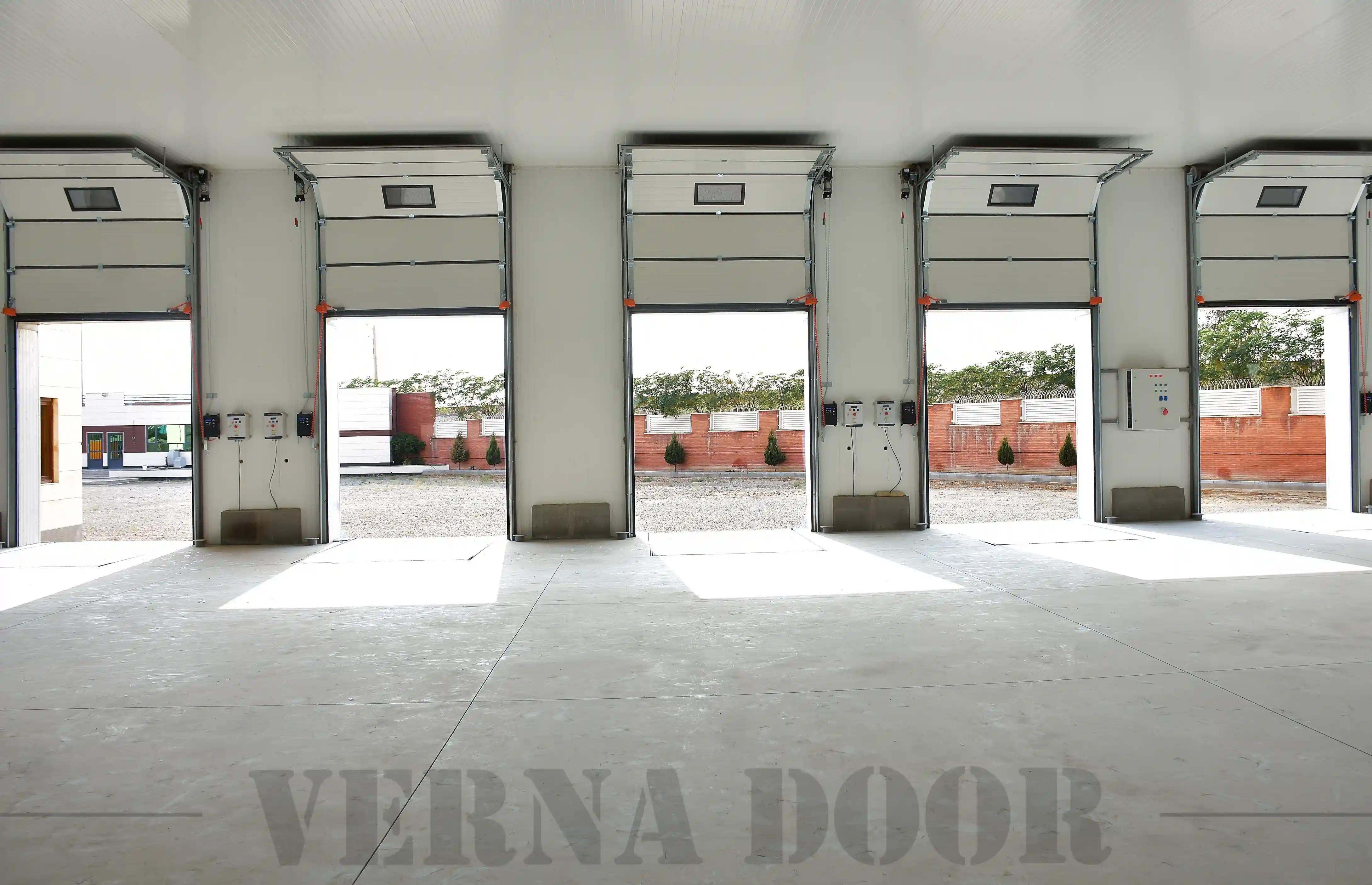 vernadoor sectional industrial garage door installed at warehouse for industrial use